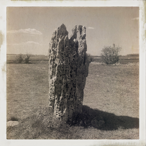another view of the hawk stone - a presumed neolithic standing stone located on its own in a field in The Cotswolds - lots of folklore and mystery attached to this stone but no archaeological facts
