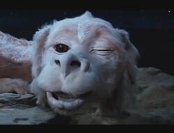 Falkor from “the never ending story” winking