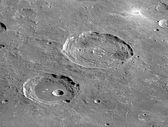 M1 was due to land in the previously unexplored Atlas Crater (right) in the Moon’s northern hemisphere.Credit: Damian Peach/Science Photo Library
