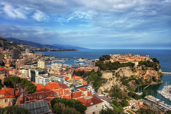 Principality of Monaco at sunset, picturesque cityscape at the Mediterranean Sea in southern Europe.