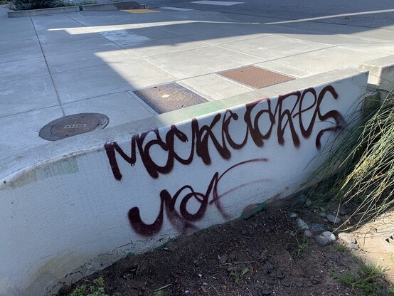 A piece of concrete tagged by "Mackclares" (or maybe something similar).  It's a oneliner piece with big loops on the "K" and the "R".
