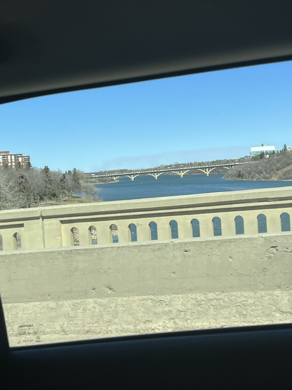 View of a bridge on the river taken from another bridge