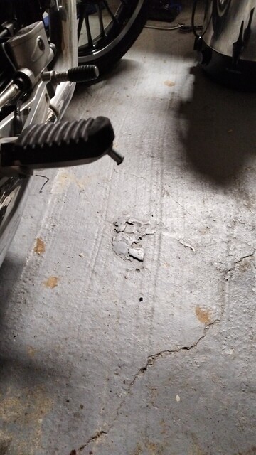 A ground off foot peg stud. The hex is gone 
