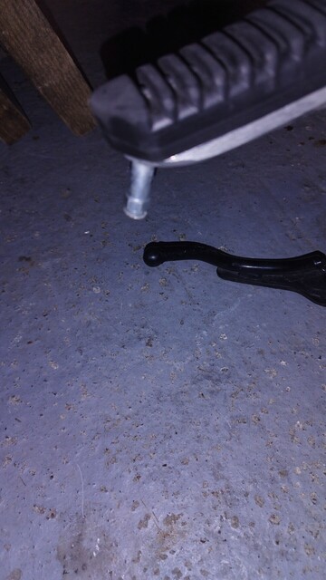 A foot peg stud is ground down to the hex 