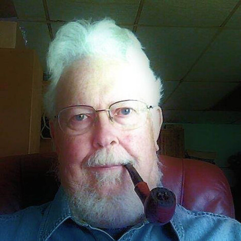 Lew McDaniel of West Virginia, USA, was worked as a linguist at Field Station Berlin between 1968-71. Here he is smoking a pipe. 