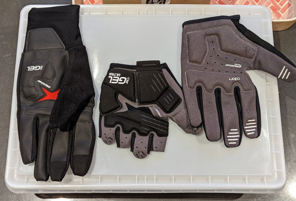 a picture of 3 bicycle gloves. a winter, summer and spring/fall one.  You're covered year-round! 