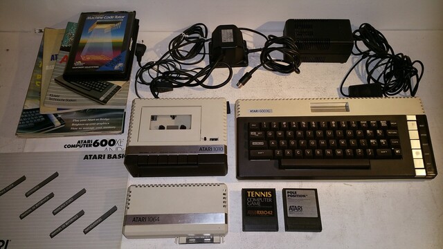Atari 600XL with tape system and memory upgrade block displayed side by side... Similar system & set-up as mine, but not my photo.