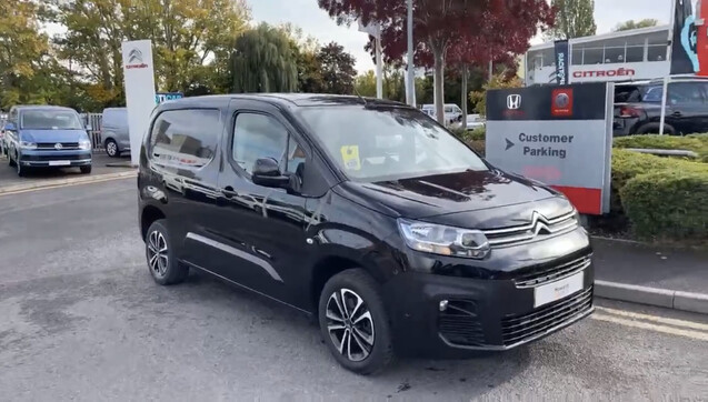 A Citroen Berlingo van in black with no modifications.