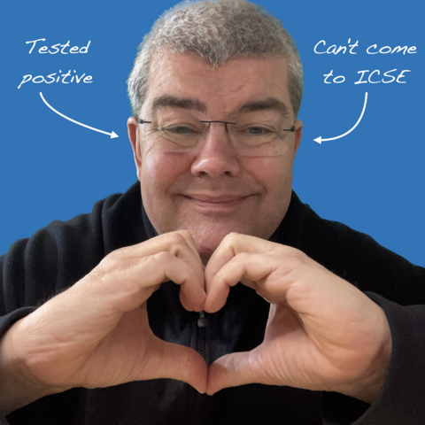 Photo of Andreas Zeller making a heart sign with his hands