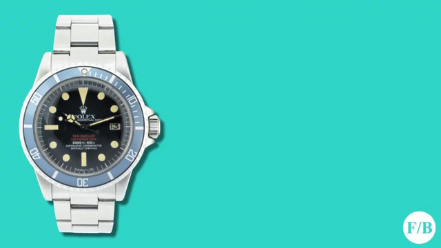 Vintage Rolex Sea-Dweller featuring a black dial, and now an almost blue bezel