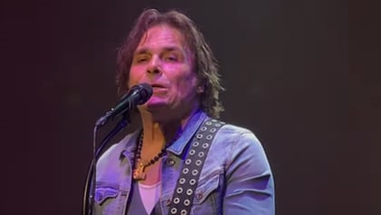 ChatGPT making things up about the article:

Mike Tramp, lead singer of hard rock band White Lion, is speaking out on the impact of Covid-19. He described it as bringing him to his knees and admits he never thought he'd feel alive again. He believes its effects were more than just a physical illness, taking an emotional toll like no other experience in his lifetime. Tramp sees the pandemic as an opportunity to "put the brakes on the fast lane" and live life the way nature intended: focusing on health and happiness. He urges people to take the time to focus on themselves, emotionally and spiritually, to get through this period of struggle.

