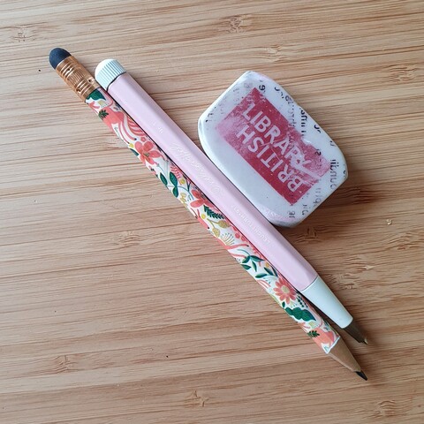 a pencil, a pen, a British Library rubber