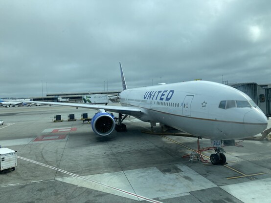 United 777-200 sitting at the gate 
