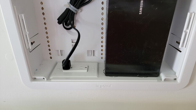 Surge protected electrical outlet for TV.