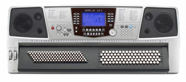 Flat electronic keyboard with accordion buttons on both left and right hand side. So the right hand side is like a French chromatic five row accordioned with all white buttons. And the left-hand side is 120 base Stradella system.