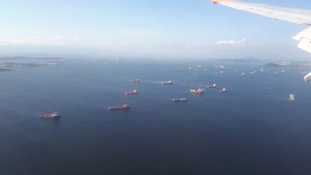 Lots of cargo ships in the sea near Rio de Janeiro
