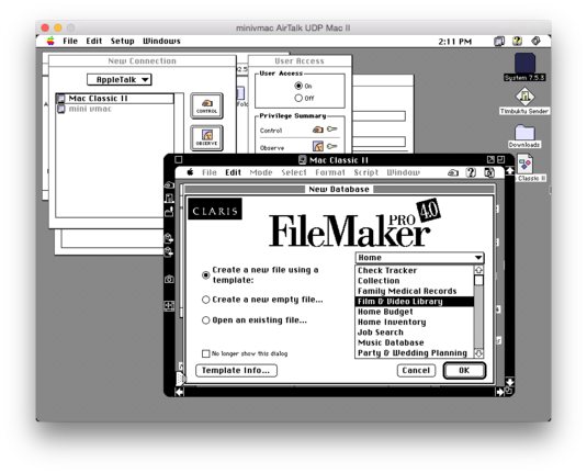 A screenshot of Mini VMac showing the desktop, a couple of Timbuktu windows, along with the desktop of another computer via AppleTalk (my Mac Classic II showing FileMaker Pro 4.0).