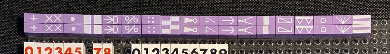 LEGO Modulex bricks with weird symbols, supposedly made for a German school.