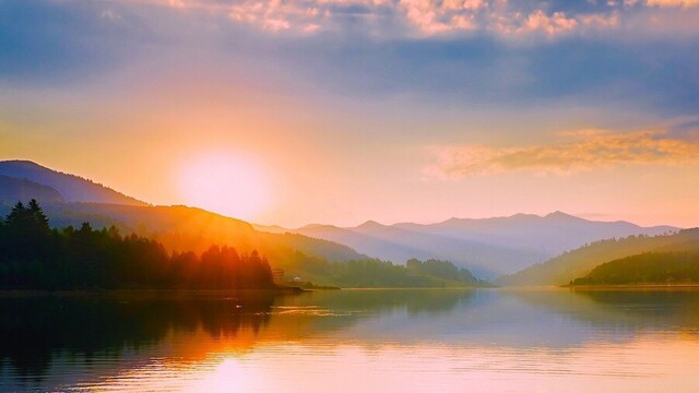 Sunrise over a mountain lake.