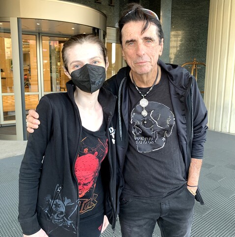 With Alice Cooper. I look like a mess, but it's alright, Alice isn't in stage clothes either. We're both wearing casual stuff with skulls.