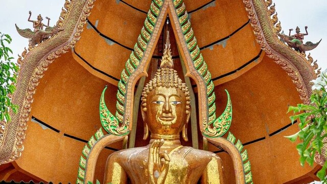 Large golden Buddha statue.