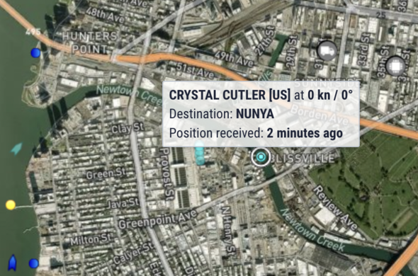 Satellite view of the Newtown Creek from Marine Traffic. Overlay text identifies a tug stopped in Blissville as the Crystal Cutler. It's destination reads Nunya.