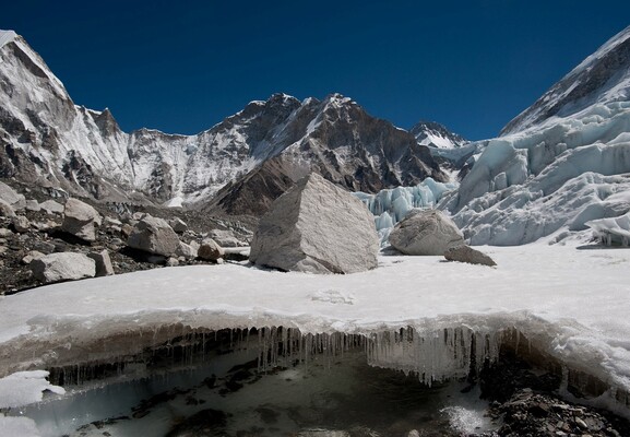 Water forms under Nepal's Khumbu glacier as the ice melts in this undated handout image [File: Alex Treadway/ICIMOD/Handout via Reuters]