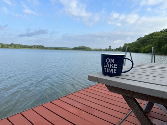 On lake time with a cup of coffee