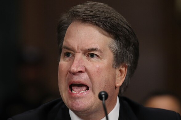 Picture of then SCOTUS nominee Brett Kavanaugh.  Extreme close up. He's visibly angrely and caught mid-shout