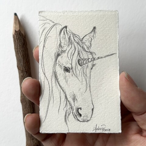 Small pencil sketch of a unicorn