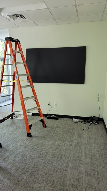 85" Samsung Frame TV we installed for Yield Private Wealth located in downtown Greenville, SC.