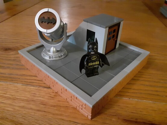 Batman waiting for Superman on the roof of Gotham PD (a LEGO creation)