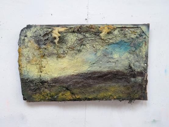 Dartmoor, Pale Yellow Sky - a painting by artist Andrew Hardwick. It's a highly stylised / abstract depiction of a moorland landscape under pale winter light. The paint is built up in contoured and textured layers of paint and other mixed media and found materials which evoke the rugged and layered nature of the moor itself.