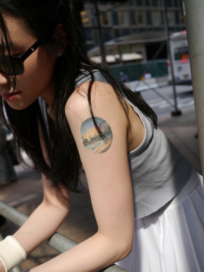 Girl with tattooed arm