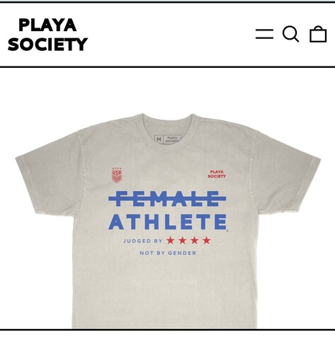 T-shirt from playing society with the uswnt that says female athlete but female is crossed out.
