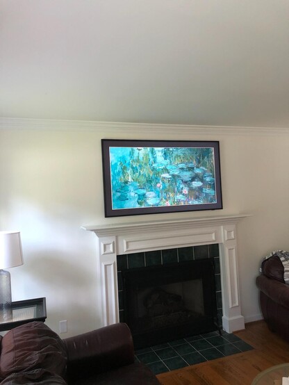 Samsung Frame TV we installed over a fireplace.