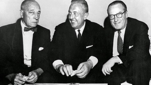 Two pictures of Middle aged, French comedian Jacques Tati hanging out with elderly, American, silent era comedians Buster Keaton, Harold Lloyd and Mildred Davis at the Oscar Awards in 1959. They are all wearing formal wear.