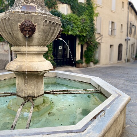 Main fountain of the village with water
