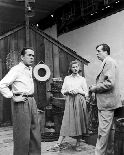 Bogart and Bacall on the set of Key Largo with Huston