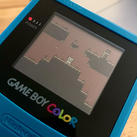#ProjectWhiskers running on a cyan Game Boy Color.