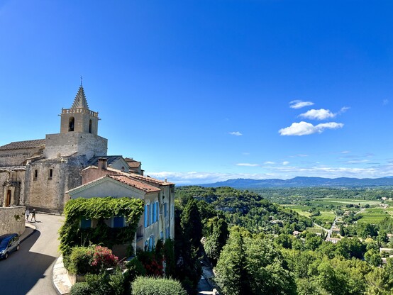View of the western side of the village on the left and the valley on the right side. 