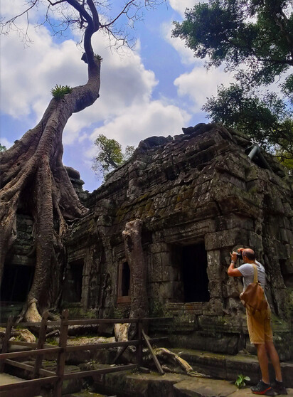 Ta Prohm or The Jungle Temple emerges the most stunning giant tree roots, notably where Tomb Raider was filmed in Angkor Complex.