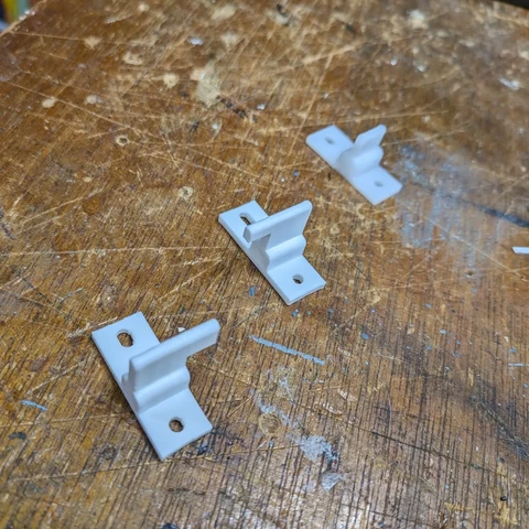 Reverse view of the original part and replacement part versions