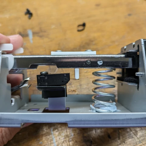 After view of the pedal showing the new part touching the switch