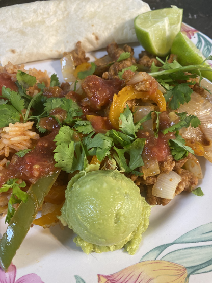 Closeup of everything and showing a scoop of guacamole 