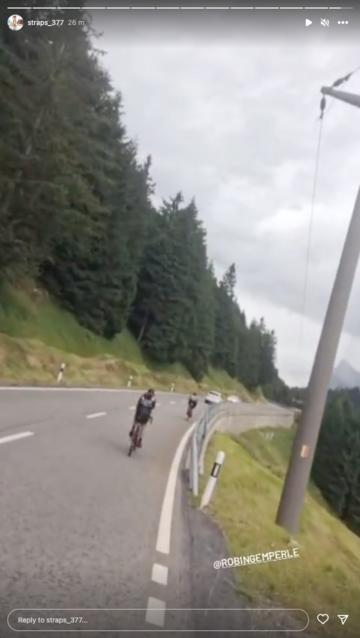 Strasser turns the camera forward, and we see two other cyclists ahead of him, slowly pedalling uphill. It's Robin Gemperle and Florian Moreau!