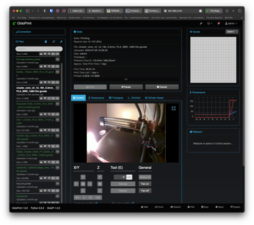 Overview of the main OctoPi UI with several panels including a webcam view of the printer and print bed in the midle and a status box above with various print stats (~1 day estimated print time). On the left is a list of all the previous prints that have been attempted and on the right is the Gcode viewer (which is currently empty) and a photo of the temp change on the hot end and print bed.