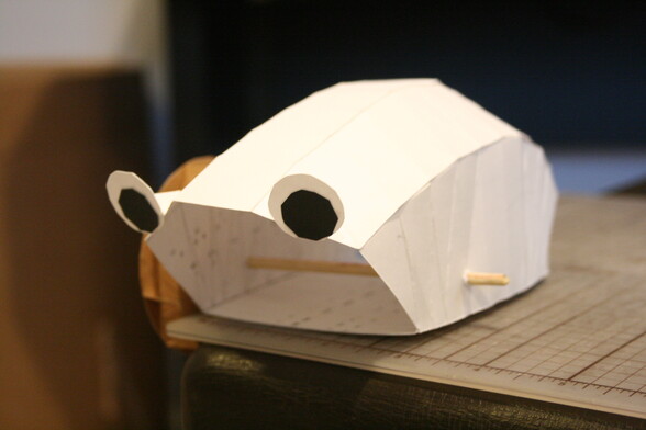 A papercraft model of Mr. Trash Wheel.