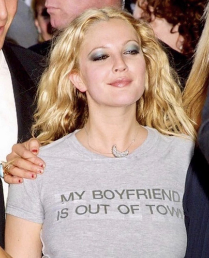 Drew Barrymore in a tshirt that reads: my boyfriend is out of town 
