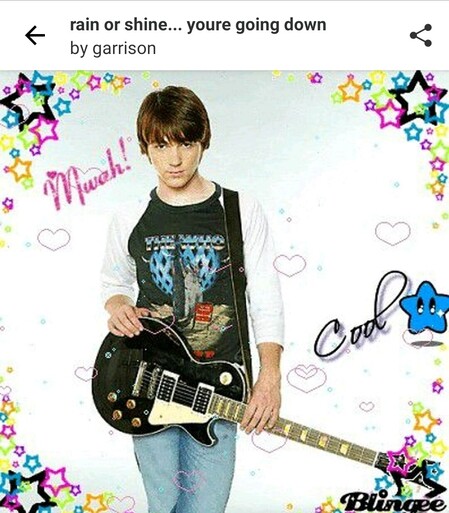 Image of kid with black guitar staring into camera all littered with pop iconics
